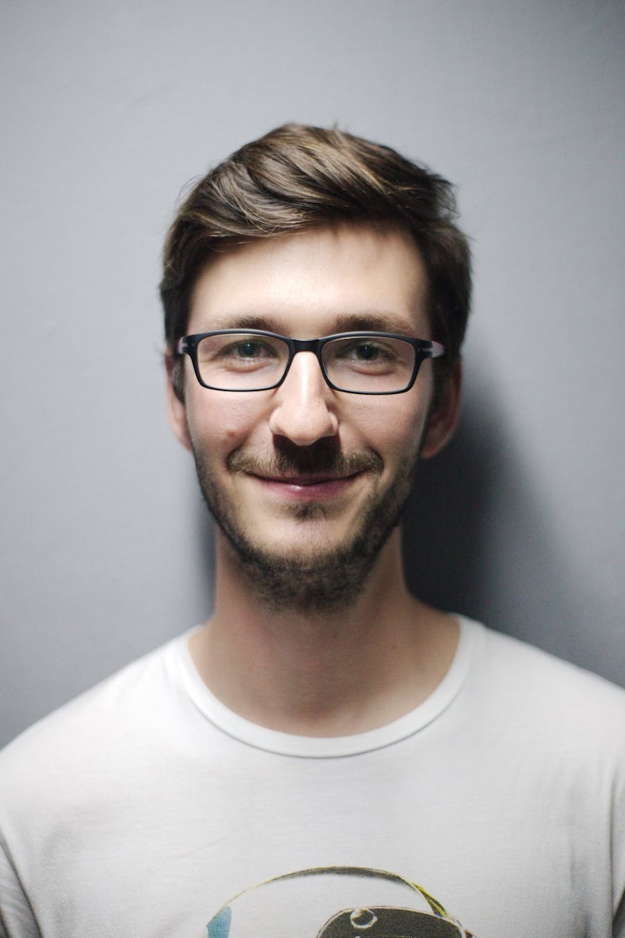 A man smiling, representing everyday wellness